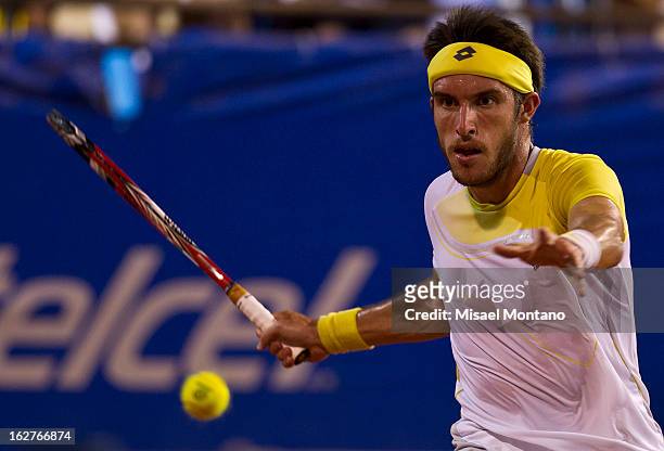 Leonardo Meyer of Argentina returns the balll to Miguel Angel Reyes of Mexico during the ATP Mexican Open Telcel at the Pacific resort on February...
