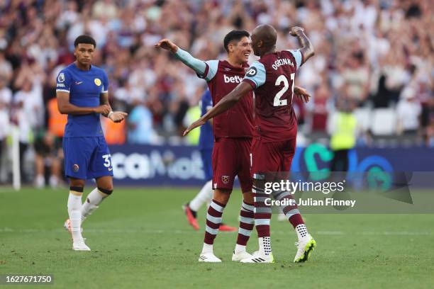 Edson Alvarez and Angelo Ogbonna of West Ham United celebrate after the team's victory in the Premier League match between West Ham United and...