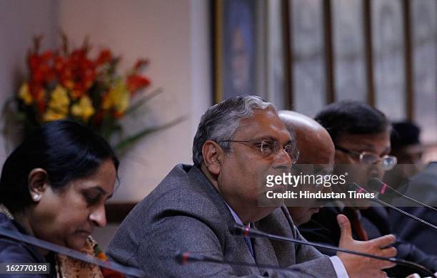 Indian Railway Board Chairman Vinay Mittal talking with media persons at Press conference after Railway Minister Pawan Kumar Bansal presented railway...