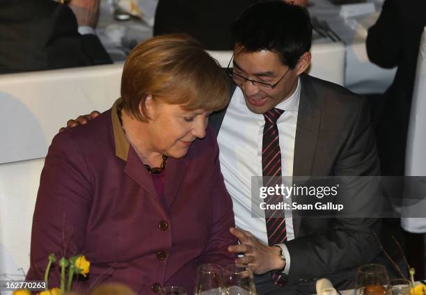 German Chancellor and Chairwoman of the German Christian Democrats Angela Merkel and Philipp Roesler, Vice Chancellor and Chairman of the German Free...