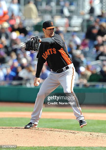 Steve Edlefsen of the San Francisco Giants delivers a pitch against the Chicago Cubs during the spring training game at Hohokam Stadium on February...