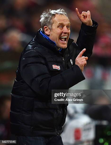 Head coach Christian Streich of Freiburg reacts during the DFB Cup Quarter Final match between FSV Mainz 05 and SC Freiburg at Coface Arena on...