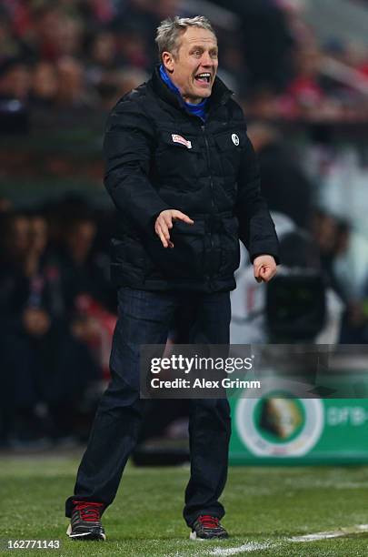 Head coach Christian Streich of Freiburg reacts during the DFB Cup Quarter Final match between FSV Mainz 05 and SC Freiburg at Coface Arena on...