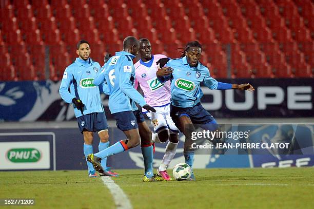 Evian's Ghanaian midfielder Mohammed Rabiu vies with Le Havre's French defender Elhadji Ba during a French Cup football match Evian vs Le Havre on...