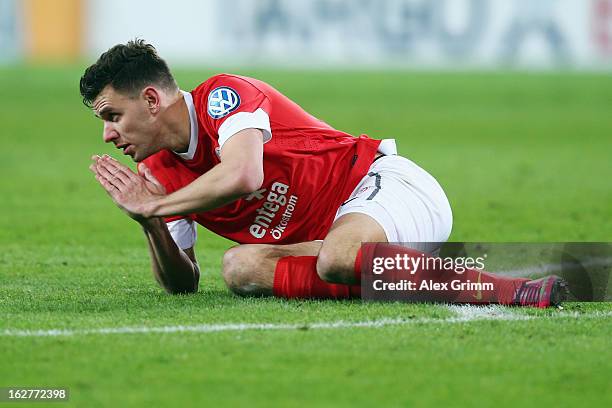 Adam Szalai of Mainz reacts during the DFB Cup Quarter Final match between FSV Mainz 05 and SC Freiburg at Coface Arena on February 26, 2013 in...