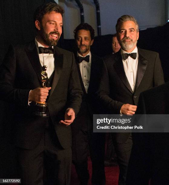 Actor-producer-director Ben Affleck, producer Grant Heslov and producer George Clooney, winners of the Best Picture award for 'Argo', backstage...