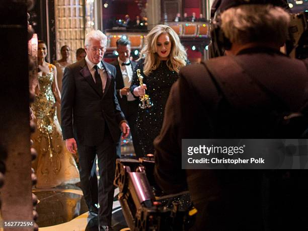 Actor Richard Gere and Adele Adkins, winner of Achievement in Music Written for Motion Pictures- Original Song, backstage during the Oscars held at...