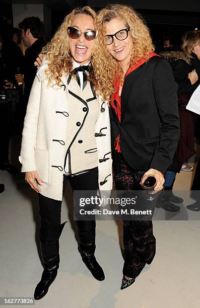 Angie Rutherford and Suzanne Wyman attend a private view of Bill Wyman's new exhibit 'Reworked' at Rook & Raven Gallery on February 26, 2013 in...