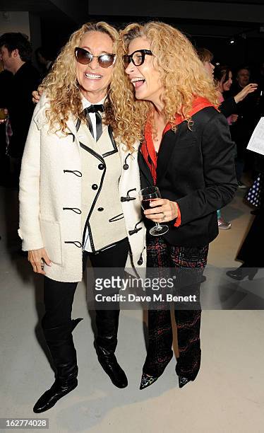 Angie Rutherford and Suzanne Wyman attend a private view of Bill Wyman's new exhibit 'Reworked' at Rook & Raven Gallery on February 26, 2013 in...