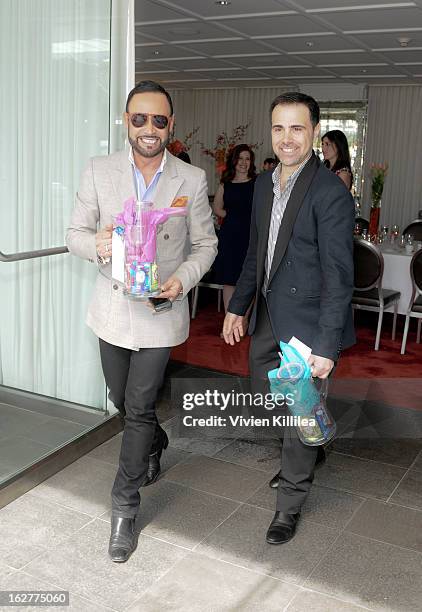 Fashion designer Nick Verreos and David Paul attend Giuliana Rancic And Crystal Light Liquid Toast Red Carpet Style at SLS Hotel on February 26, 2013...