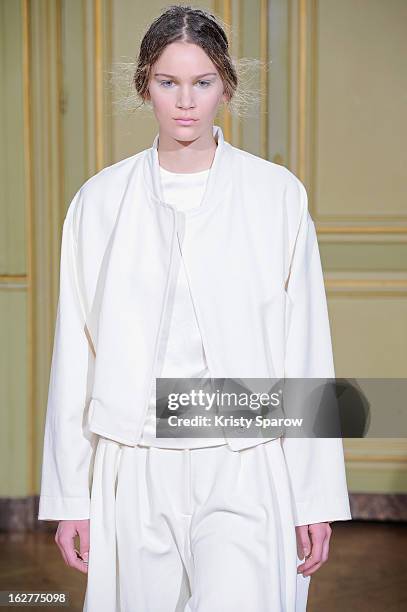 Model walks the runway during the Moon Young Hee Fall/Winter 2013/14 Ready-to-Wear show as part of Paris Fashion Week at Hotel de Varengeville on...