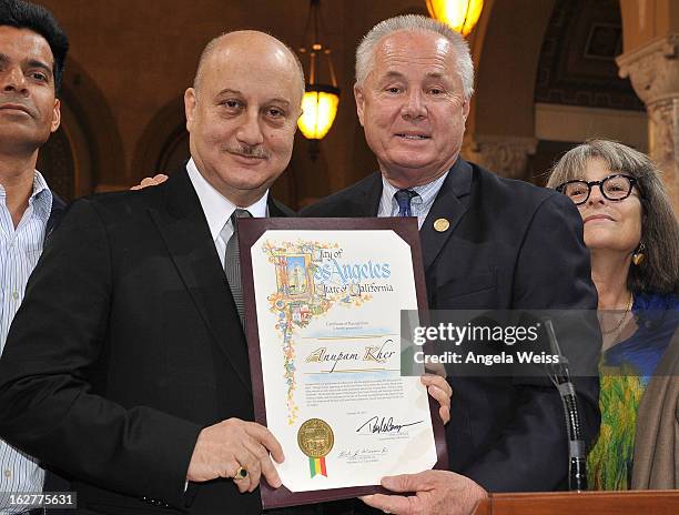 Actor Anupam Kher is presented with the Los Angeles City Proclamation by Councilmember Tom Labonge at Los Angeles City Hall on February 26, 2013 in...