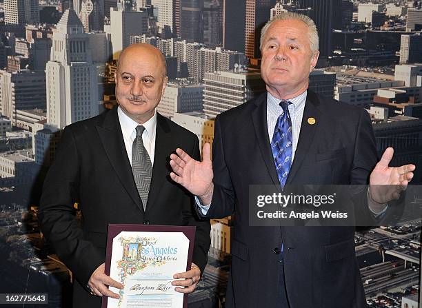 Actor Anupam Kher is presented with the Los Angeles City Proclamation by Councilmember Tom Labonge at Los Angeles City Hall on February 26, 2013 in...