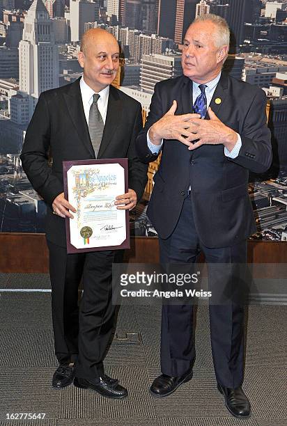 Actor Anupam Kher is presented with the Los Angeles City Proclamation by Councilmember Tom Labonge at Los Angeles City Hall on February 26, 2013 in...