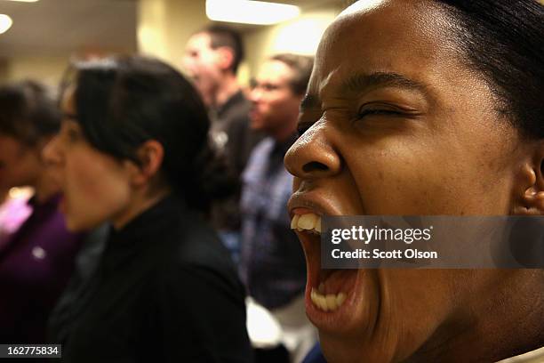 Marine Recruit Stacey Graham of Richmond, Virginia and other Marine recruits respond to a drill instructor’s orders to call home shortly after...