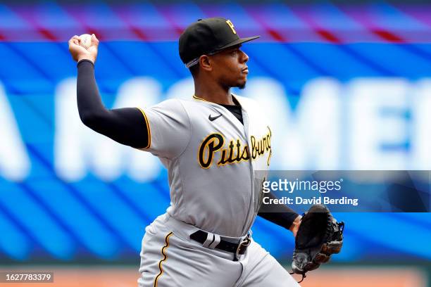 Ke'Bryan Hayes of the Pittsburgh Pirates throws the ball to first base to get out Ryan Jeffers of the Minnesota Twins in the third inning at Target...