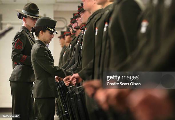 LtCol. Gabrielle Hermes , inspects Female Marine recruits under her command and nearing their graduation from boot camp on February 26, 2013 at MCRD...