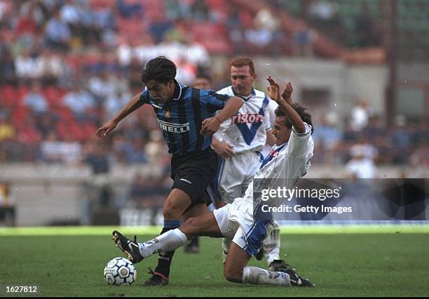 Alvaro Recoba of Inter Milan is tackled by a Brescia defender during the Serie A match at the San Siro in Milan, Italy. \ Mandatory Credit: Allsport...