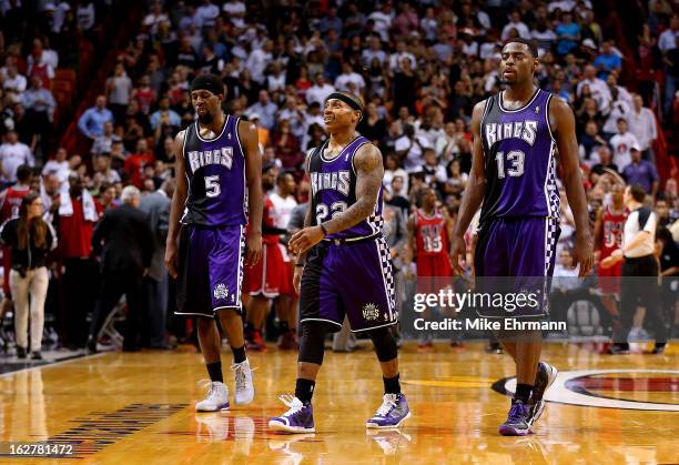 John Salmons Marcus Thornton and Tyreke Evans of the Sacramento Kings react to a play during a game against the Miami Heat at American Airlines Arena...