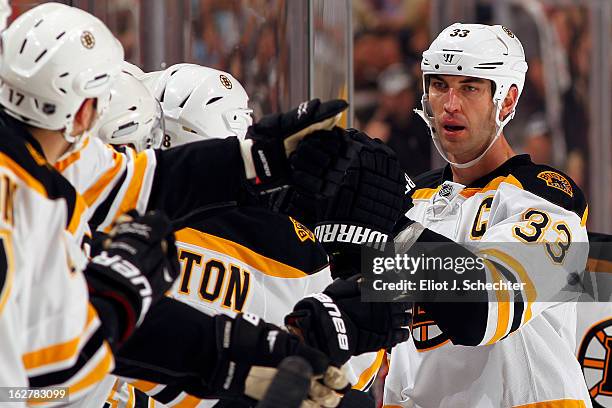 Zdeno Chara of the Boston Bruins celebrates his goal with teammates against the Florida Panthers at the BB&T Center on February 24, 2013 in Sunrise,...