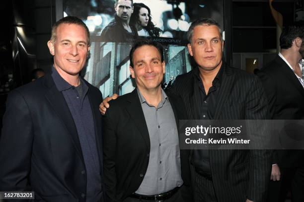 Executive Producer Peter Schlessel, Michael Luisi and Stuart Ford arrive to the premiere of FilmDistricts's "Dead Man Down" at ArcLight Hollywood on...