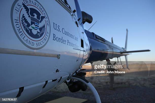 Pilot from the U.S. Office of Air and Marine prepare a helicopter for an aerial patrol on February 26, 2013 in Tucson, Arizona. The U.S. Customs and...