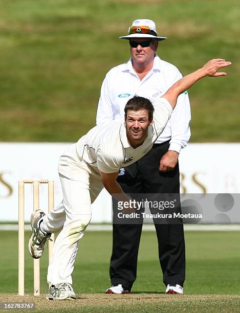 Carl Cachopa of the New Zealand XI bowls during the International tour match between New Zealand XI and England at Queenstown Events Centre on...