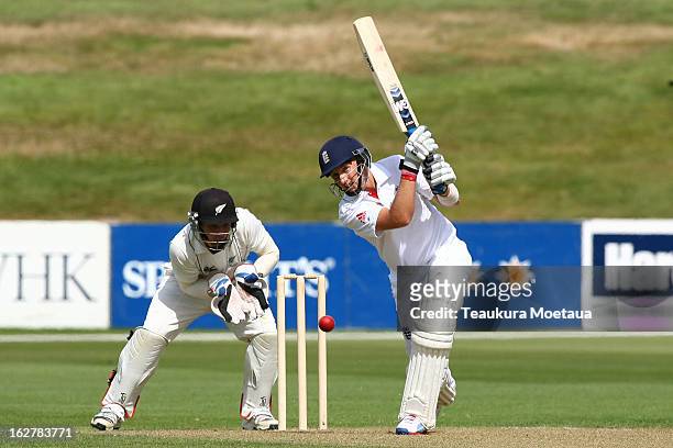 Joe Root of England hits to the offside during the International tour match between New Zealand XI and England at Queenstown Events Centre on...
