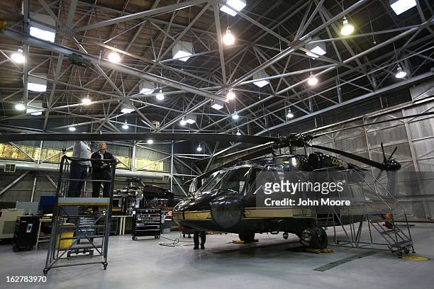 Maintenance workers prepare a blackhawk helicopter from the U.S. Office of Air and Marine , on February 26, 2013 in Tucson, Arizona. The OAM, a U.S....