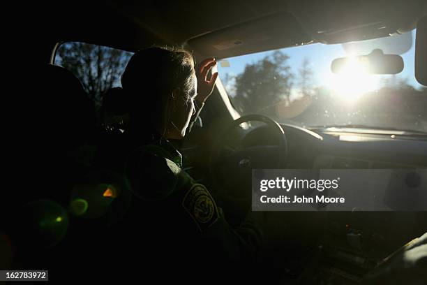 Border Patrol agent drives along the U.S. Border with Mexico on February 26, 2013 near Sonoita, Arizona. The Federal government has increased the...