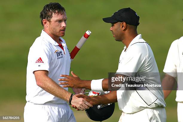 Ian Bell of England is congratulated by Jeetan Patel of New Zealand XI after the International tour match between New Zealand XI and England at...