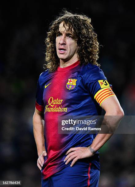 Carles Puyol of FC Barcelona looks on during the Copa del Rey Semi Final second leg between FC Barcelona and Real Madrid at Camp Nou on February 26,...