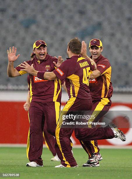 Ryan Harris of the Bulls celebrates with team-mates the wicket of Fawad Ahmed of the Bushrangers and winning the Ryobi One Day Cup final match...