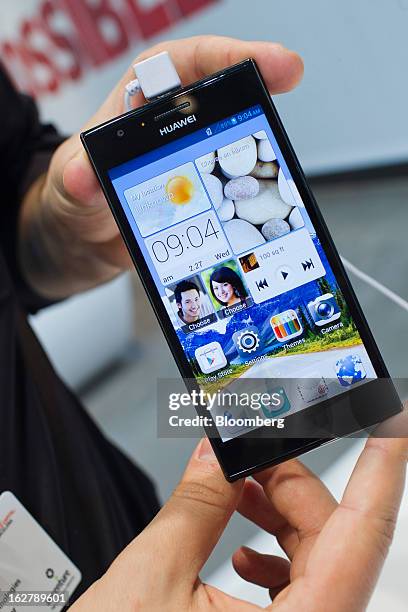 Huawei Technologies Co. Ascend P2 smartphone is displayed for a photograph at the Mobile World Congress in Barcelona, Spain, on Wednesday, Feb. 27,...