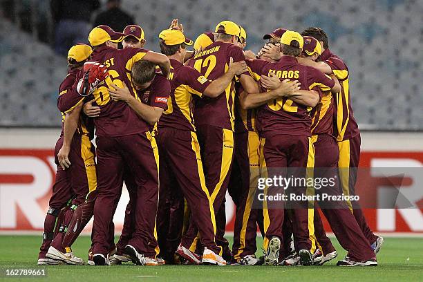 Bulls players celebrate winning the Ryobi One Day Cup final match between the Victorian Bushrangers and the Queensland Bulls at Melbourne Cricket...