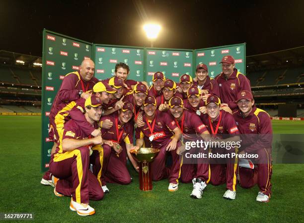 Bulls players pose with the Ryobi One Day Cup after winning the Ryobi One Day Cup final match between the Victorian Bushrangers and the Queensland...