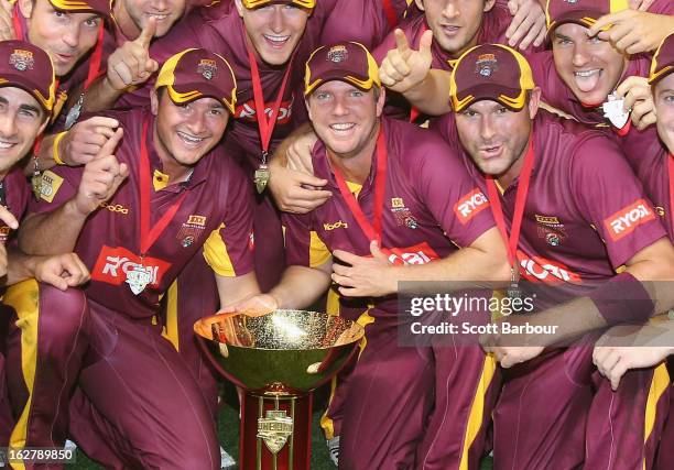 Peter Forrest, James Hopes and Ryan Harris of the Bulls pose with the Ryobi One Day Cup after winning the Ryobi One Day Cup final match between the...