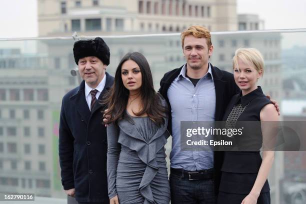 Director Sam Raimi and actors Mila Kunis, James Franco and Michelle Williams during a photocall before Walt Disney Pictures Moscow premiere of 'Oz...