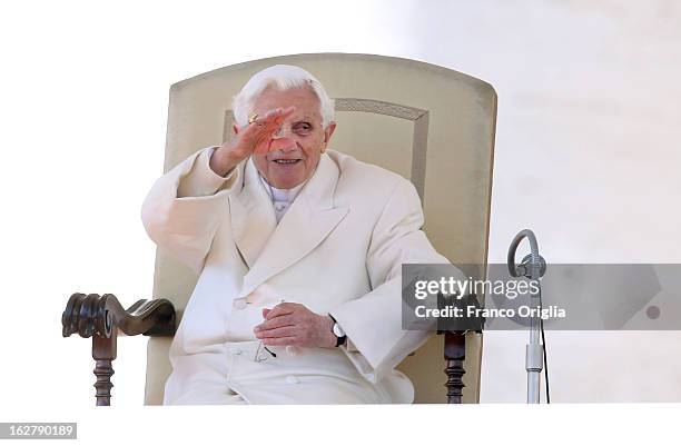 Pope Benedict XVI waves to the faithful during his final general audience in St Peter's Square, on February 27, 2013 in Vatican City, Vatican. The...