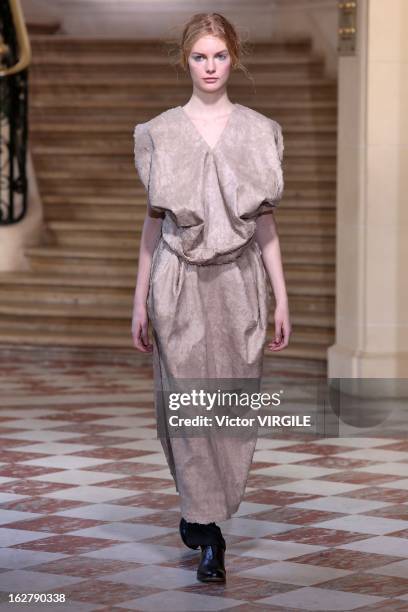 Model walks the runway during the Moon Young Hee Fall/Winter 2013/14 Ready-to-Wear show as part of Paris Fashion Week at Hotel de Varengeville on...