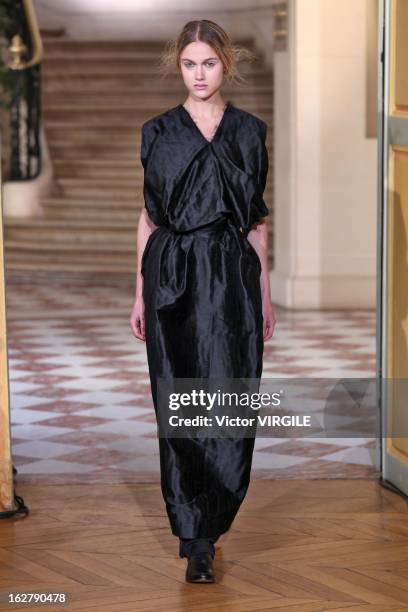 Model walks the runway during the Moon Young Hee Fall/Winter 2013/14 Ready-to-Wear show as part of Paris Fashion Week at Hotel de Varengeville on...