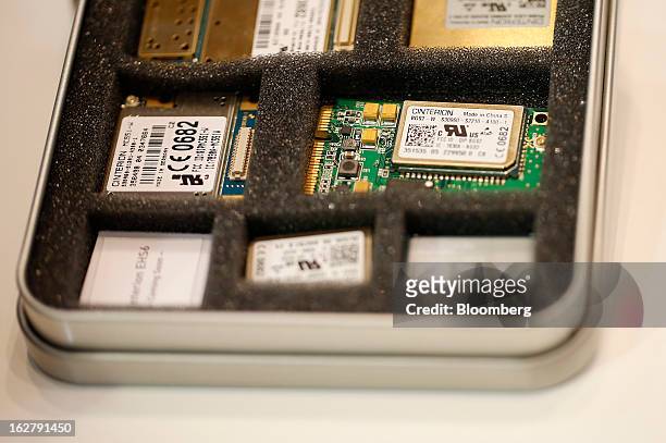 Variety of microprocessors sit in a display case at the Gemalto NV pavilion during the Mobile World Congress in Barcelona, Spain, on Wednesday, Feb....