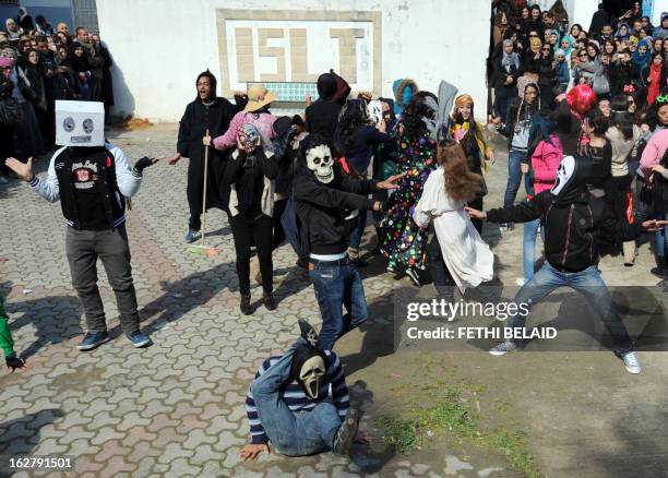 Tunisian students of the Bourguiba Language Institute in the El Khadra neighbourhood, a Salafist bastion of the capital Tunisia, perform the Internet...