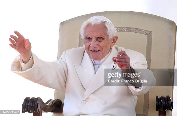 Pope Benedict XVI waves to the faithful gathered in St. Peter's Squareduring his final general audience on February 27, 2013 in Vatican City,...