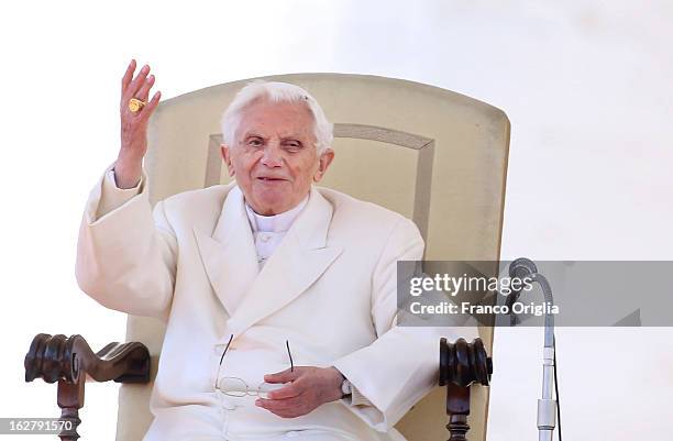 Pope Benedict XVI waves to the faithful gathered in St. Peter's Squareduring his final general audience on February 27, 2013 in Vatican City,...