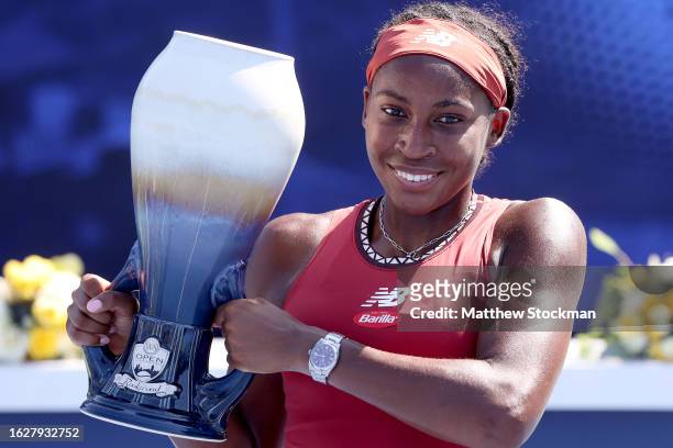 Coco Gauff poses with the trophy after defeating Karolina Muchova of Czech Republic during the final of the Western & Southern Open at Lindner Family...