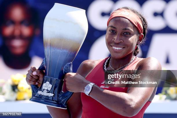 Coco Gauff poses with the trophy after defeating Karolina Muchova of Czech Republic during the final of the Western & Southern Open at Lindner Family...