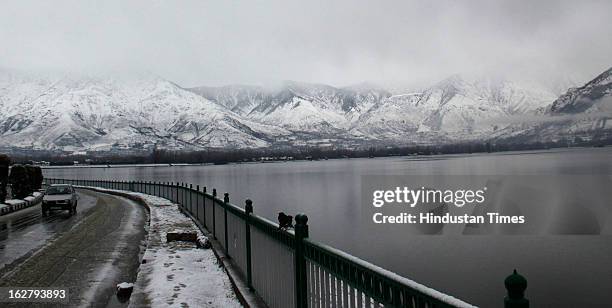 View of fresh snow coverd mountain on February 27, 2013 in Srinagar, India. Kashmir valley was hit by a fresh spell of rains and snow during the...