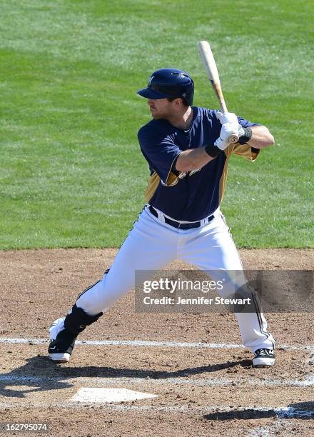 Taylor Green of the Milwaukee Brewers bats in the spring training game against the Oakland Athletics at Maryvale Baseball Park on February 23, 2013...