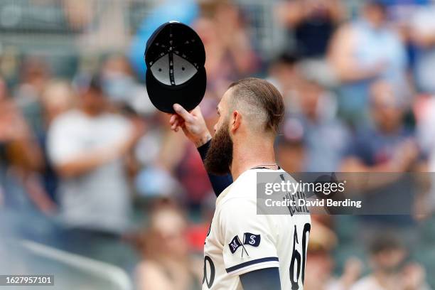 Dallas Keuchel of the Minnesota Twins tips his hat as he walks out of the game against the Pittsburgh Pirates in the seventh inning at Target Field...